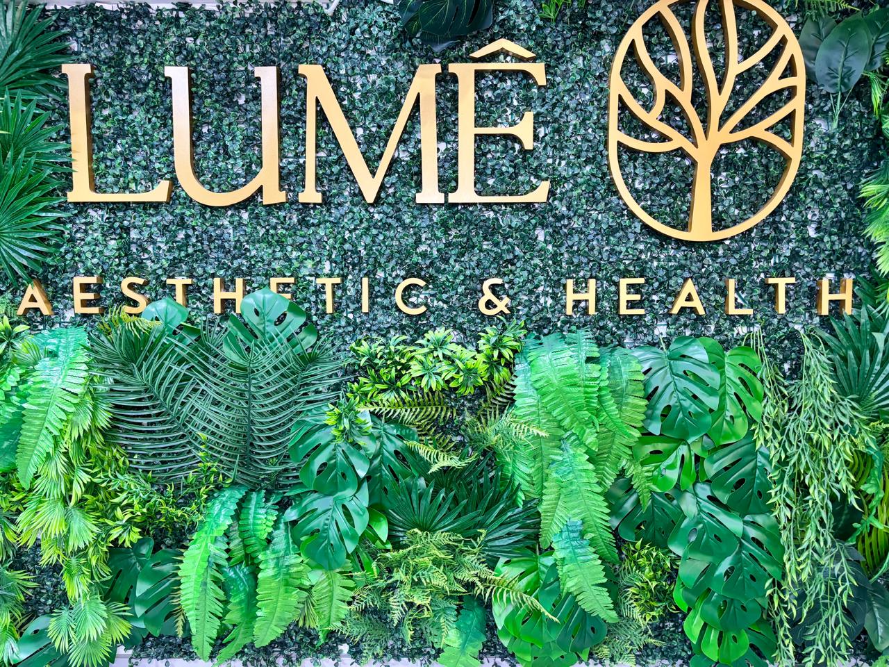 Parede de identidade da LUMÊ Aesthetic & Health